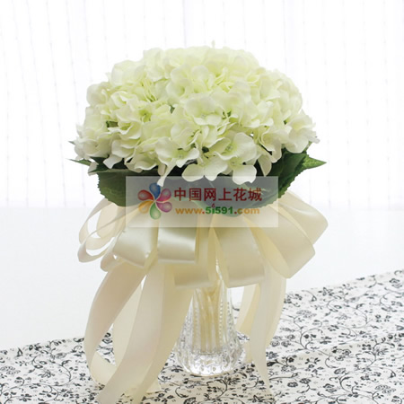 Simulated flowers holding flowers for a lifetime